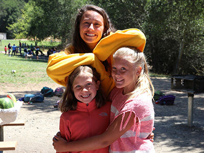 Counselor with her happy campers