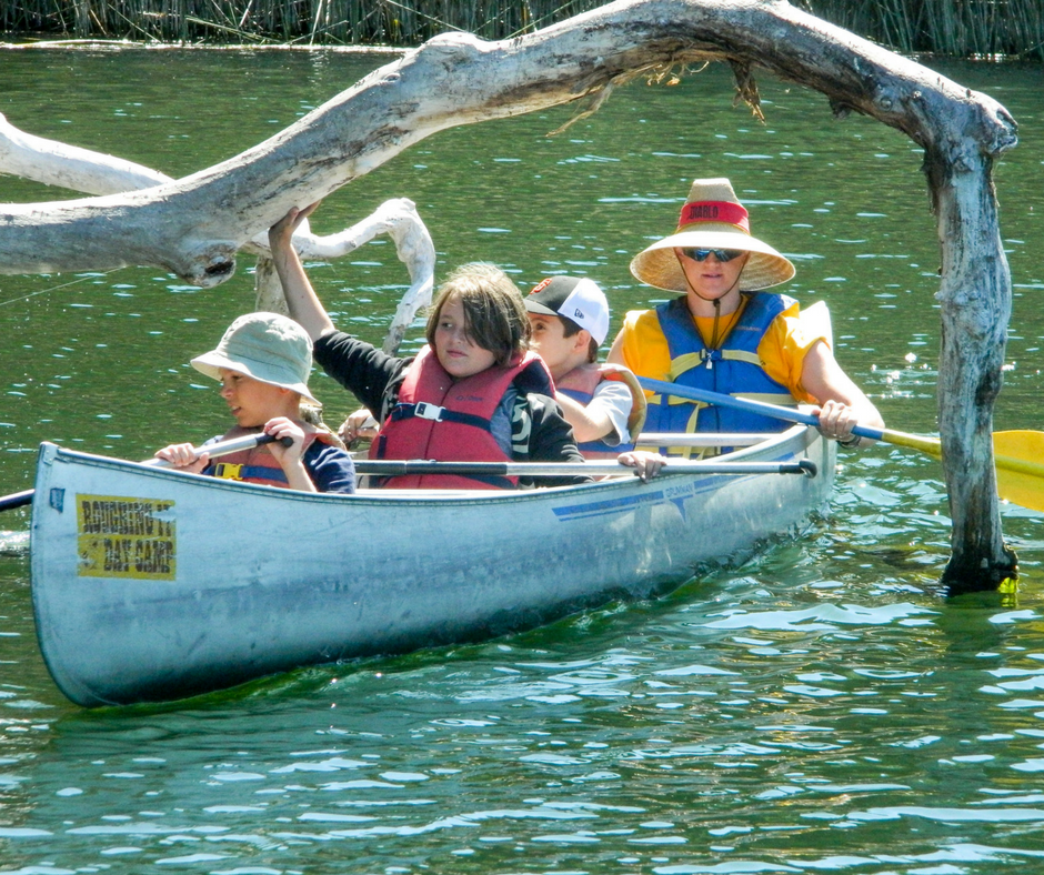 Campers traverse the Reservoir in a canoe