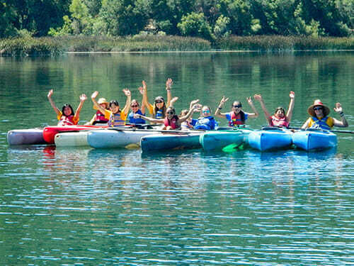 Tenn Campers Pose in Kayaks as a Group