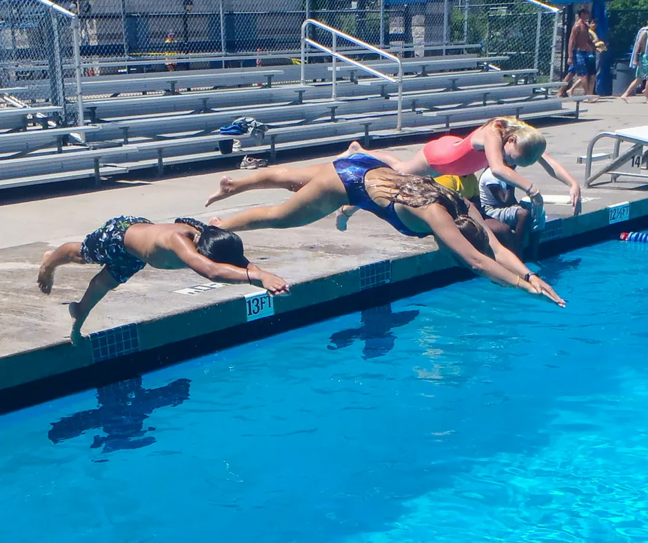 Kids diving at swimming