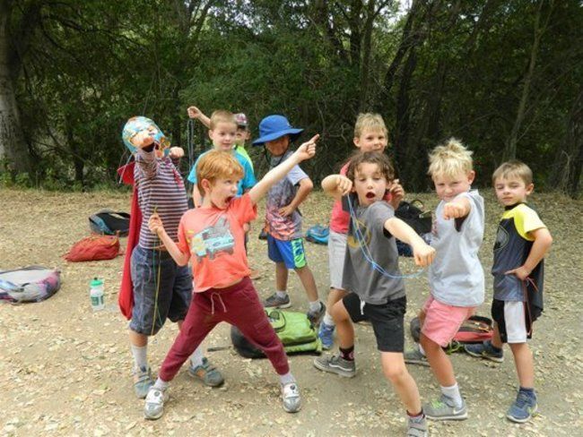boy camper group dressed up, playing at the lafayette reservoir