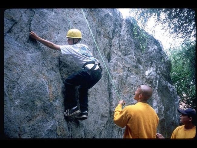 Campers enjoy rock climbing.